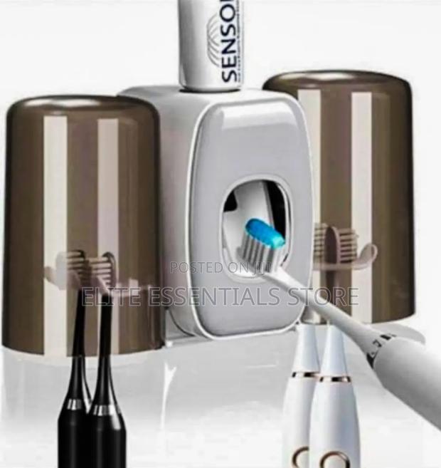 High Quality Toothbrush Holder Toothpaste Dispenser · Photo 1