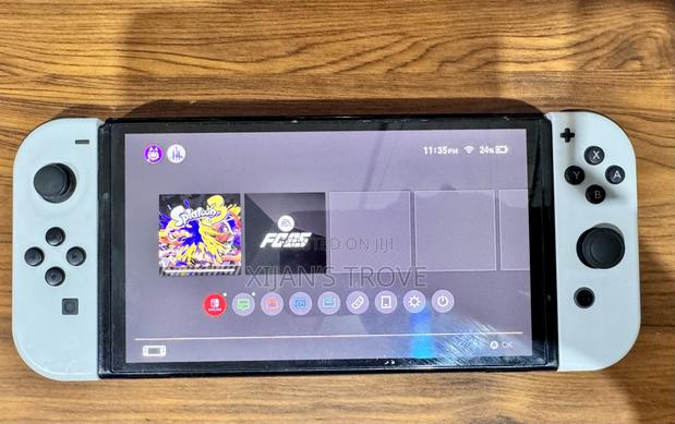 Nintendo Switch Oled - White With All Accessories and Two Games. photo 3