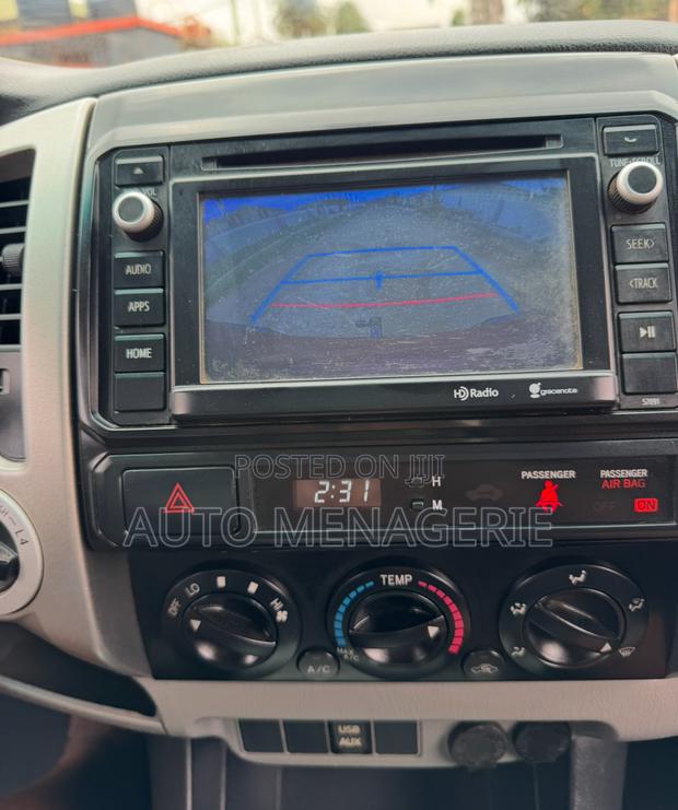 Toyota Tacoma 2dr Regular Cab 4WD 6.1 ft. SB (2.7L 4cyl 4A) 2014 Red