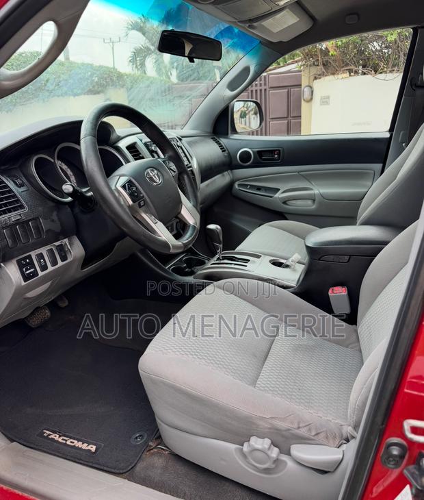 Toyota Tacoma 2dr Regular Cab 4WD 6.1 ft. SB (2.7L 4cyl 4A) 2014 Red