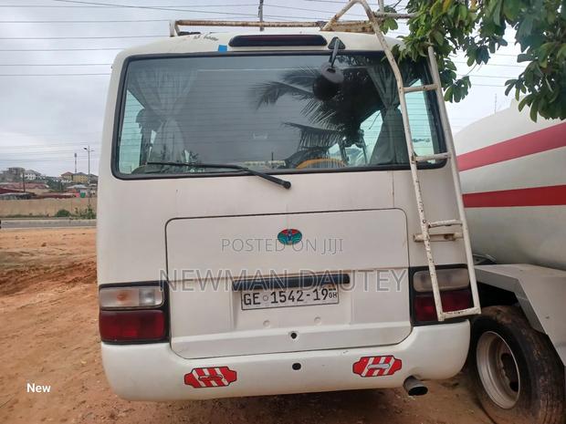 Toyota Coaster 2010 Beige