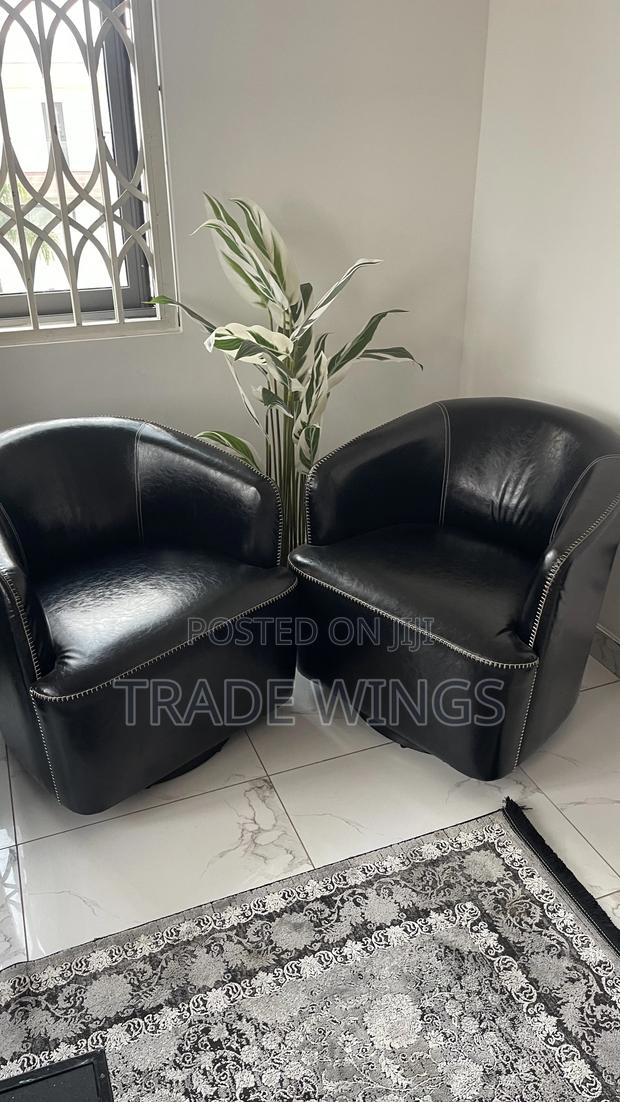 Two Black Leather Chairs With Wheel for Podcast Office and Home Use