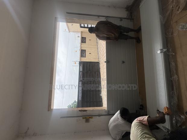 Garage Door System · Photo 4