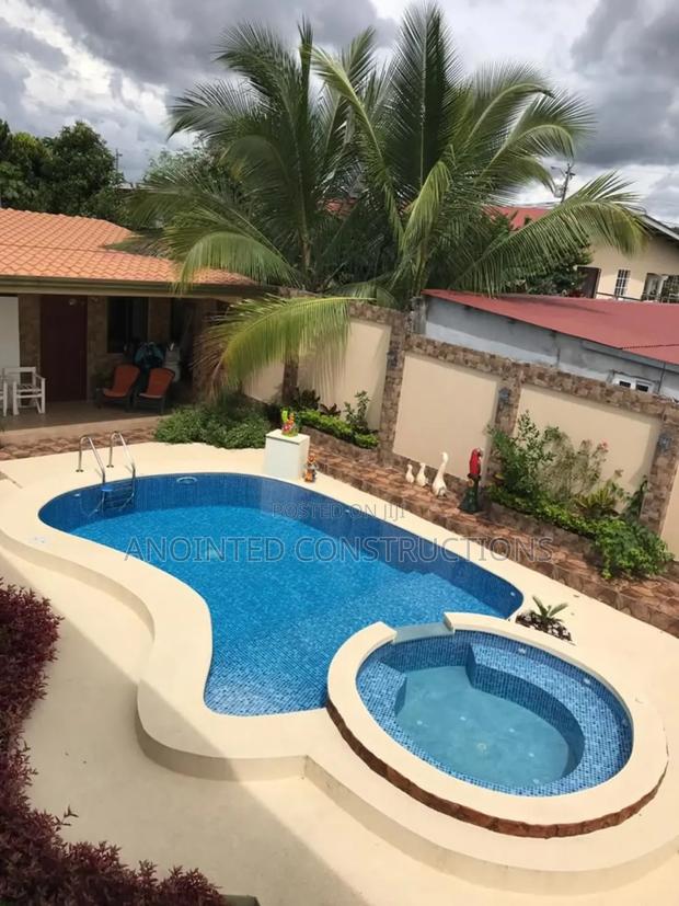 Affordable Swimming Pool Construction · Photo 1