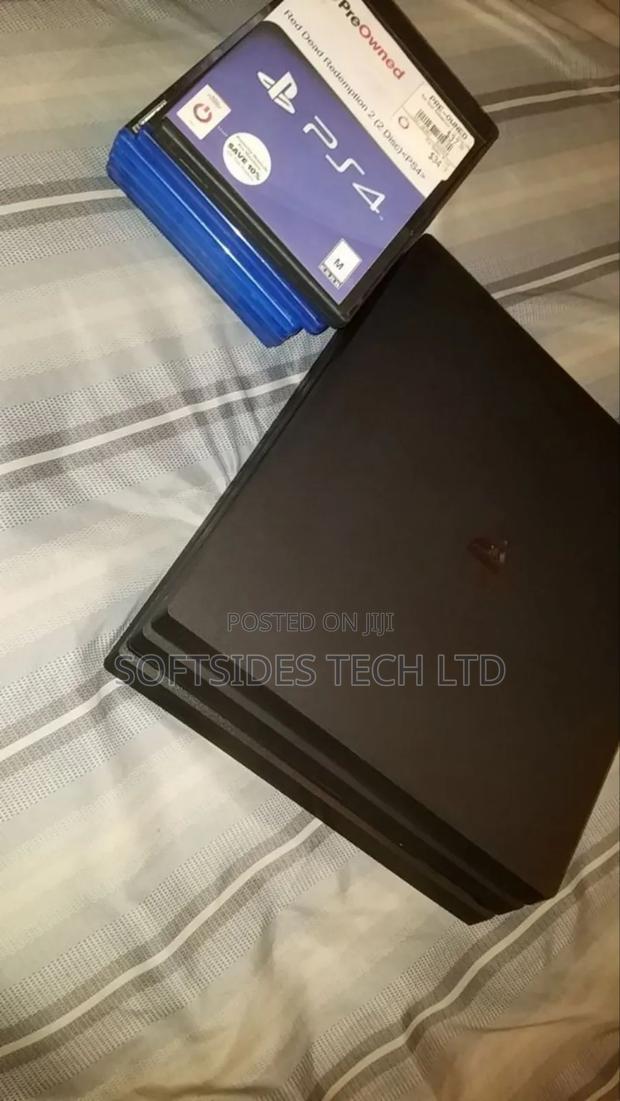 Black Sony Ps4 Pro or Playstation 4 Pro With 15 Hot Games Installed photo 4