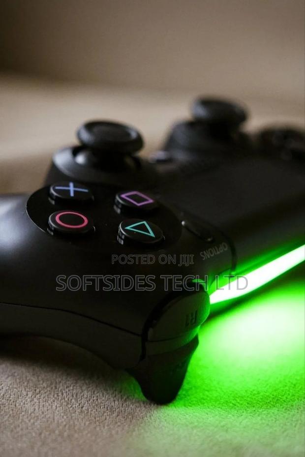 Black Sony Ps4 Pro or Playstation 4 Pro With 15 Hot Games Installed photo 5