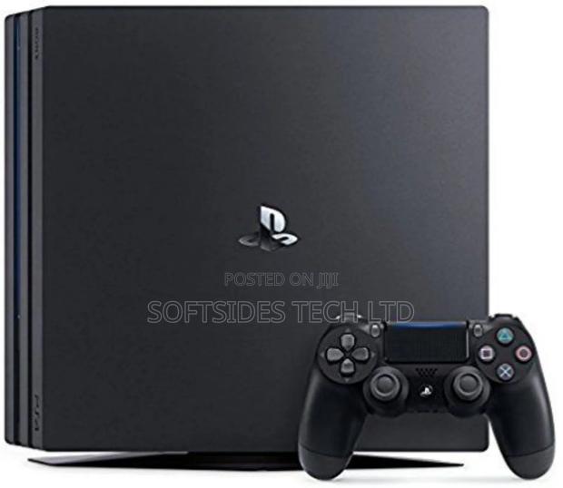 Black Sony Ps4 Pro or Playstation 4 Pro With 15 Hot Games Installed photo 3