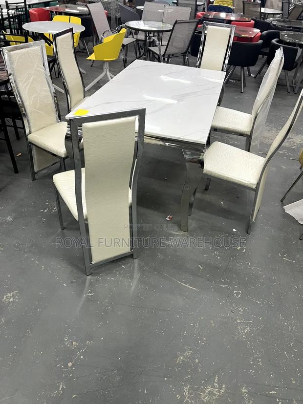6 Seater and Glossy Marble Dining Set · Photo 4