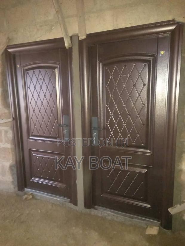 Neatly Installed 2 Singles Doors · Photo 2