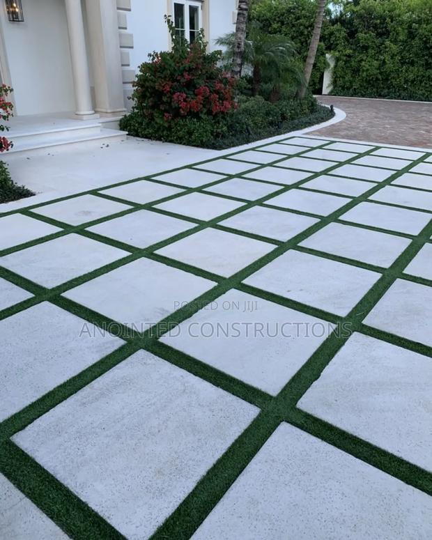 Quality Concrete Slabs and Astroturf Landscape · Photo 2