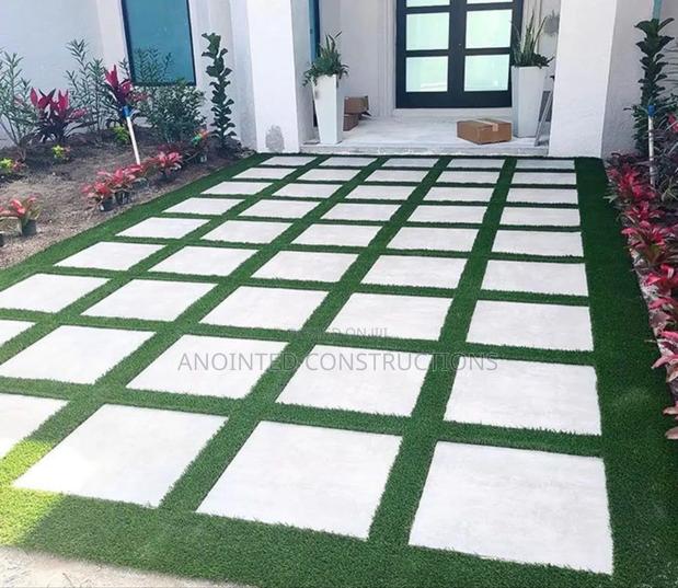 Quality Concrete Slabs and Astroturf Landscape · Photo 4