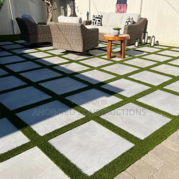 Quality Concrete Slabs and Astroturf Landscape · Photo 3