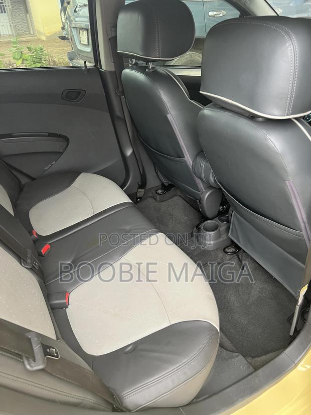 Chevrolet Spark 1LT 4dr Hatchback (1.2L 4cyl CVT) 2014 Yellow photo 5