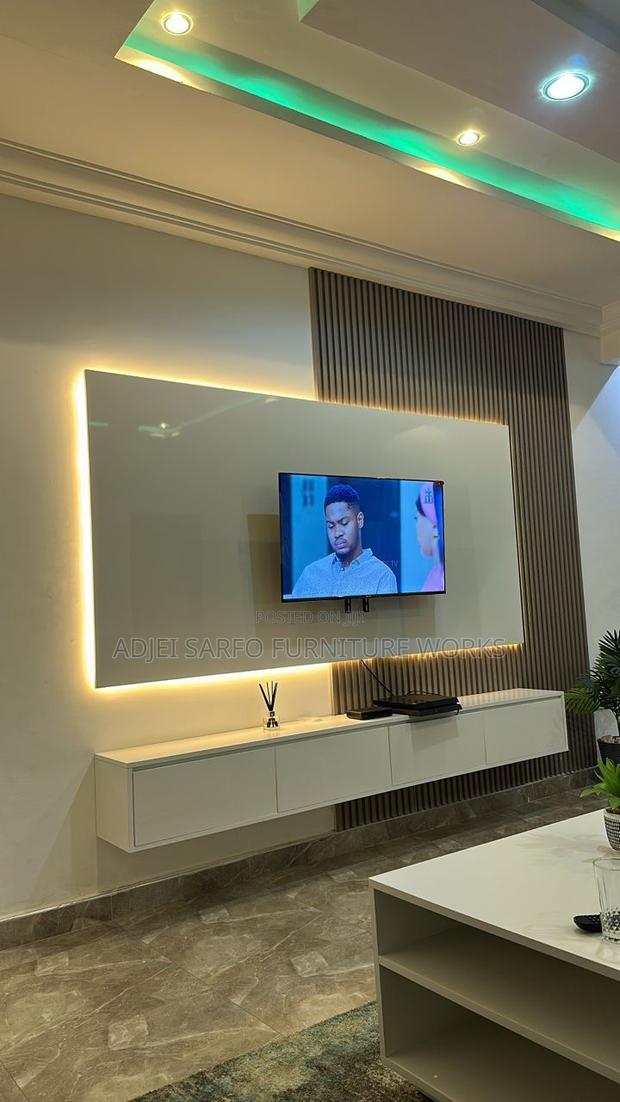 Foreign Tv Stand With Led Board and Wall Panels · Photo 2