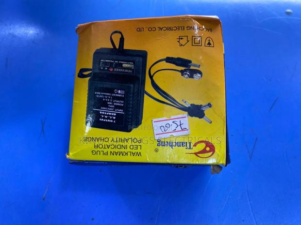 Trancheng Universal Plug Adapter Charger–Led Indicator Polarity Change