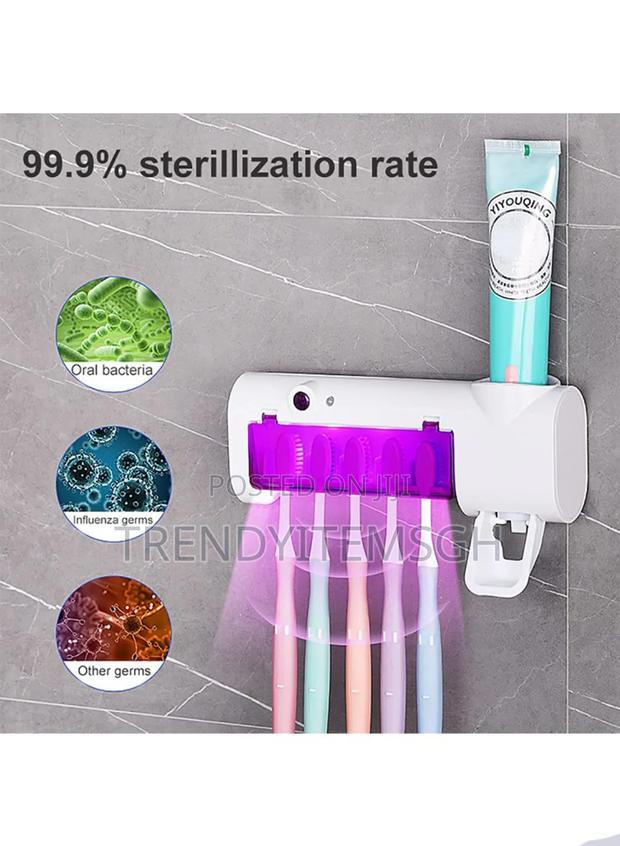 Electric Toothbrush Holder Uv Sterilizer With Toothpaste Dispenser · Photo 4