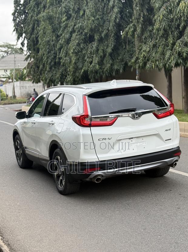 Honda CR-V Touring 4dr SUV AWD (1.5L 4cyl CVT) 2017 White photo 4