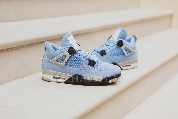 Air Jordan 4 Retro “ University Blue “ Sneakers · Photo 4