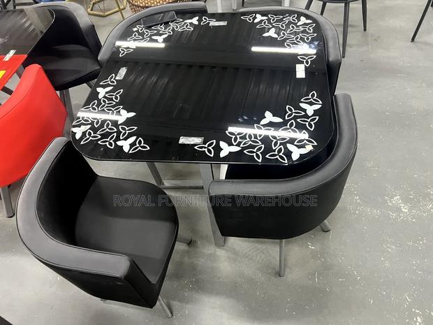 Top Finish Tempered Glass Dining Set · Photo 4