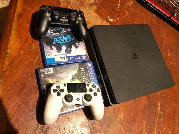 Ps4 1tb With Two Controllers and 4 Games