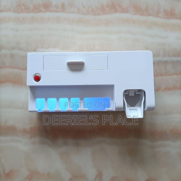 Toothbrush/Toothpaste Dispenser · Photo 3