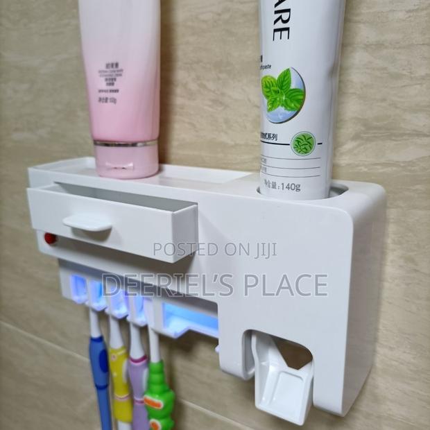 Toothbrush/Toothpaste Dispenser · Photo 2