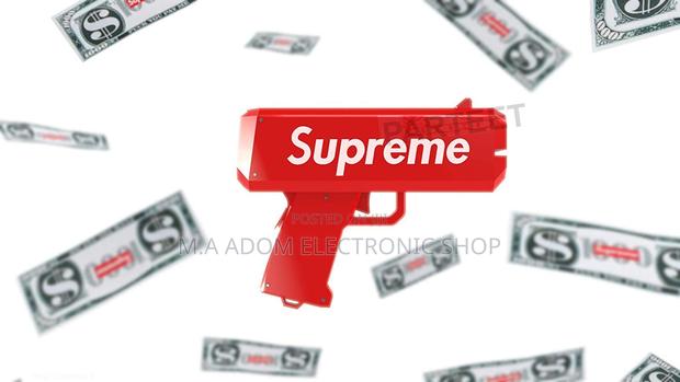 Supreme Toy Money Gun · Photo 2