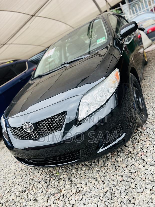 Toyota Corolla 2009 Black photo 2
