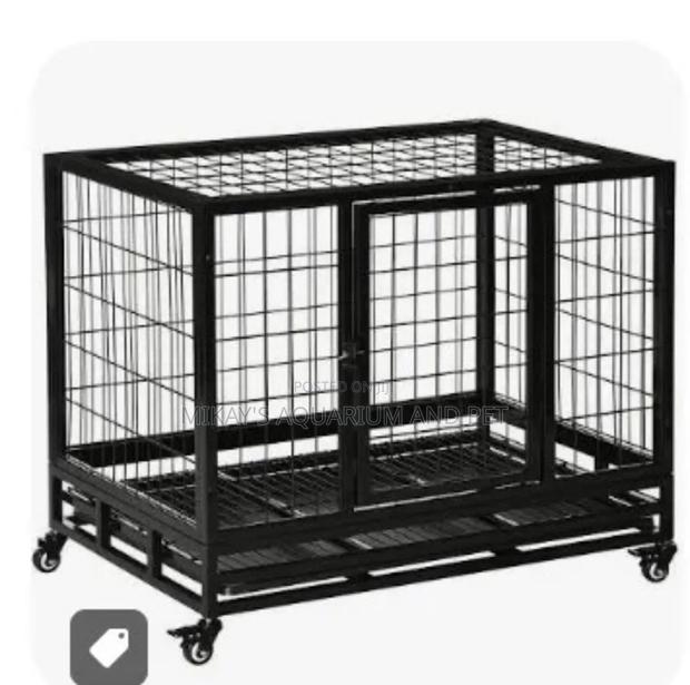 Dog and Cat Metal Cage With Wheels · Photo 4