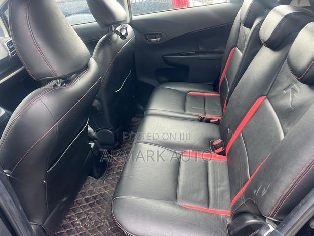Toyota Ractis 1.5 AWD 2013 Black photo 9