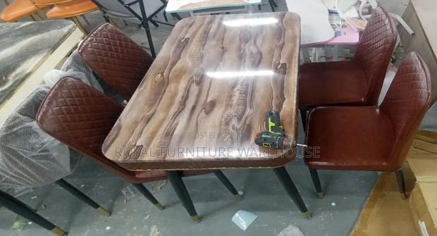 Imported 4 Seater Dining Set With Heavy Marble Top · Photo 4