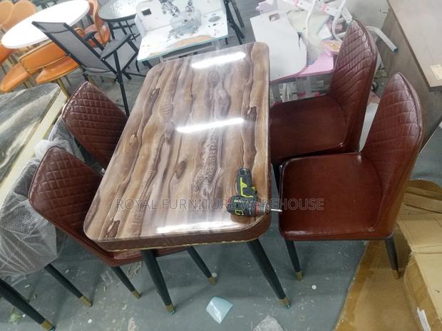 Imported 4 Seater Dining Set With Heavy Marble Top · Photo 3