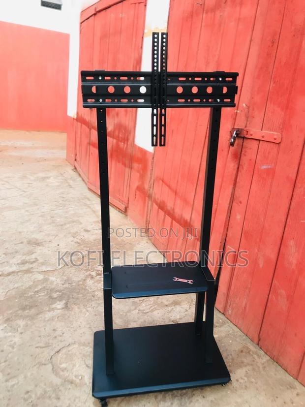 Professional Mobile Tv Mount With Dual Shelves and Wheels · Photo 2