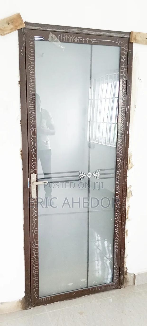 Brown Design Outside Open Glass Door and Accessories
