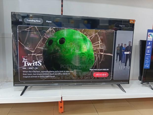 32inches Q Led Display Smart Tv Power by Goggle Tv · Photo 1