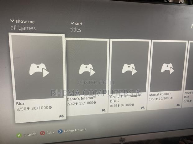 Xbox 360 Slim With 9 Games and a Controller photo 6