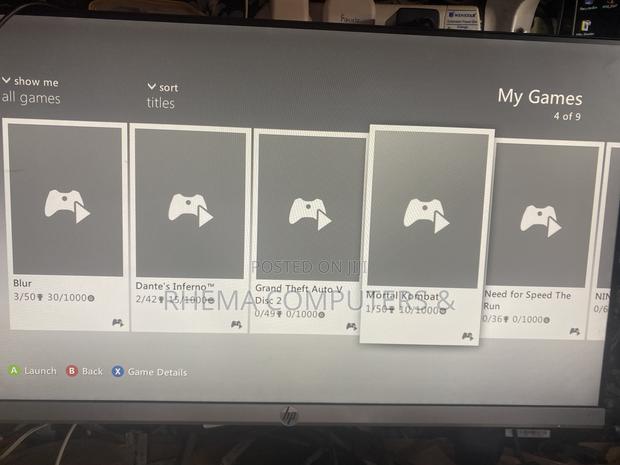 Xbox 360 Slim With 9 Games and a Controller photo 4