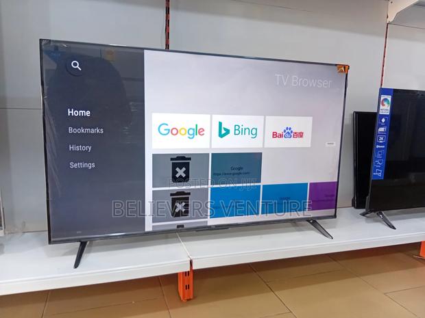 TCL Google Resolution Qled Smart Tv · Photo 1