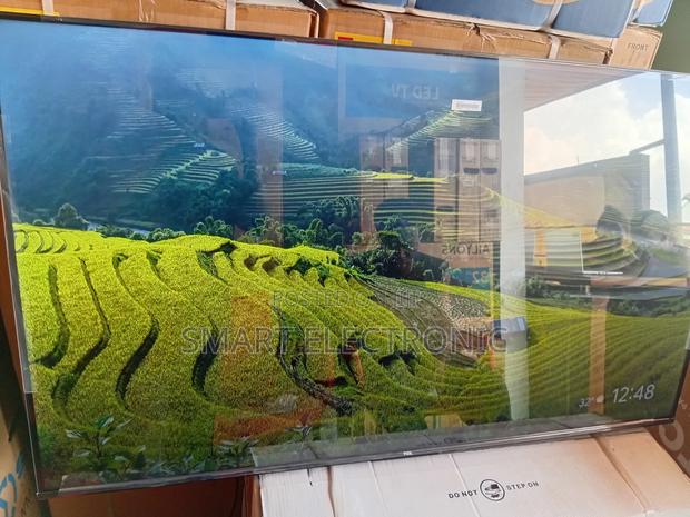 TCL 65-Inch Uhd Smart Tv With Dolby Vision Hdr10+ · Photo 4