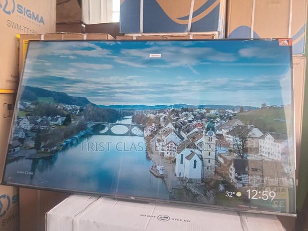 Home Happiness Comes With TCL Digital Uhd TCL Tv · Photo 4