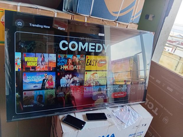 12. “Go Big With Tcl! 65-Inch Smart Tv on Sale Now!” · Photo 4