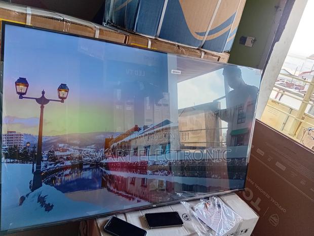 14. “Transform Movie Nights With Tcl’S 65-Inch Qled Tv ” · Photo 4