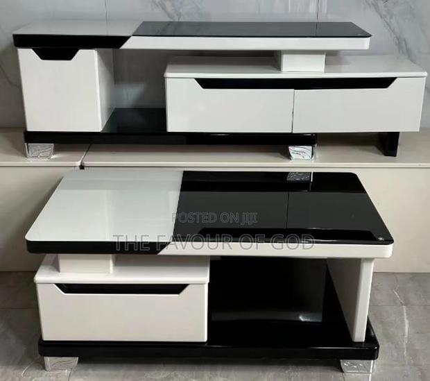 A Stunning Glass Center Table With Tv Stand