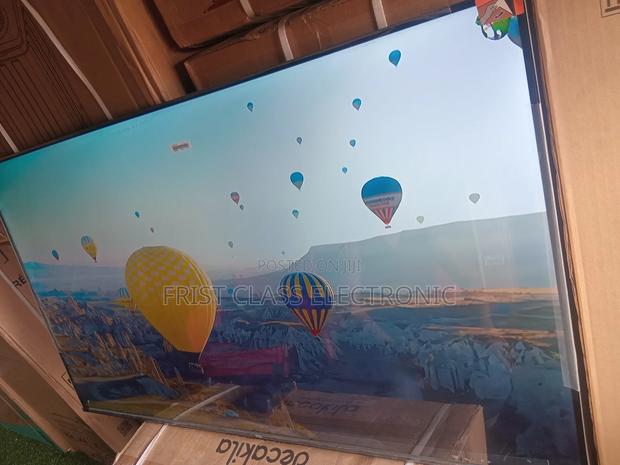Big Screen Entertainment Made Affordable by TCL Digital Uhd TCL Tv · Photo 3