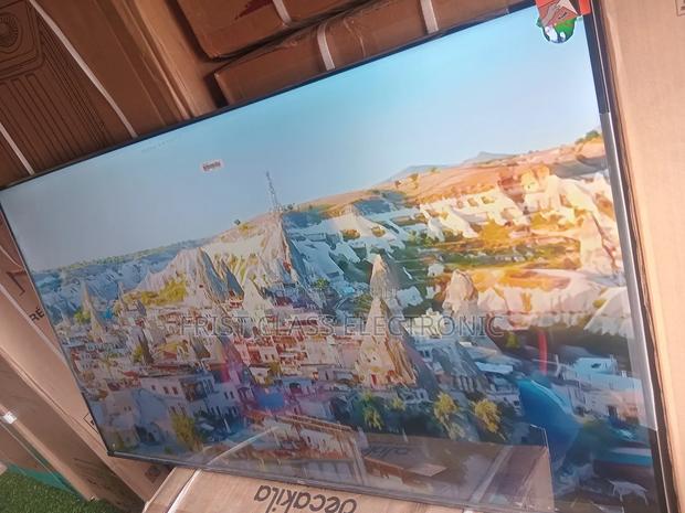 Big Screen Entertainment Made Affordable by TCL Digital Uhd TCL Tv · Photo 4