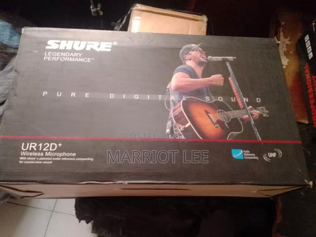 4 in 1 Wireless Microphone · Photo 1