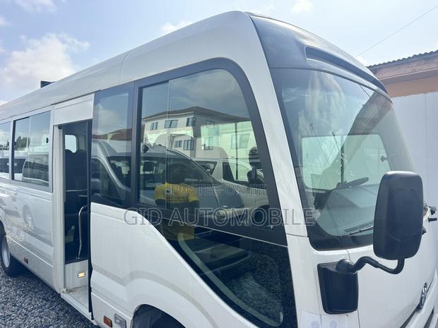 New Toyota Coaster 2025 Grey