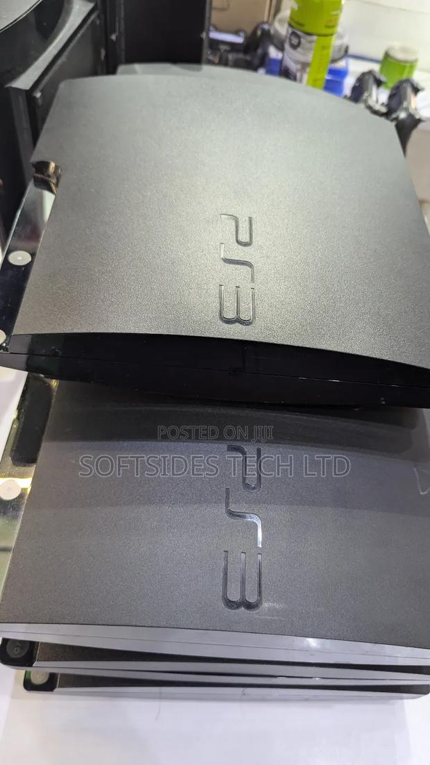 Black Playstation 3 Slim Cute Version With Games and a Controller