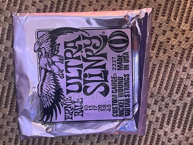 Ernie Ball Ultra Slinky Electric Guitar Strings. · Photo 3