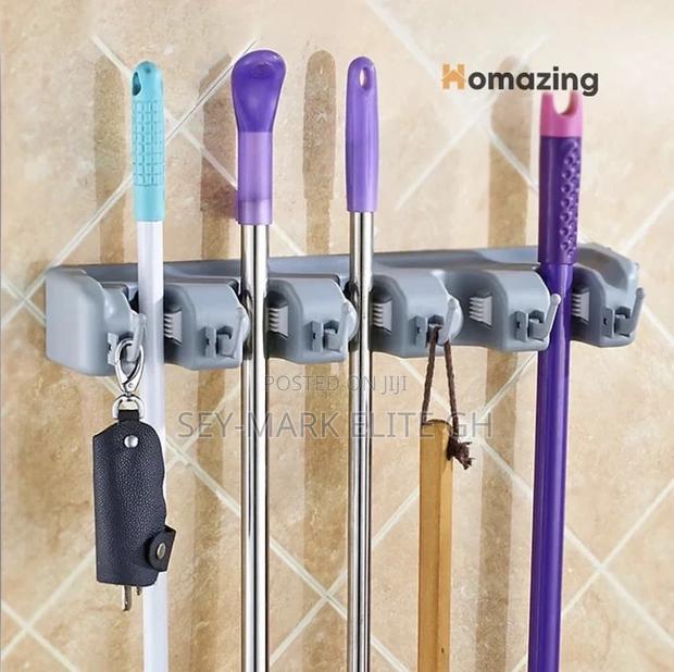 Broom Mop Sticks Holder · Photo 4